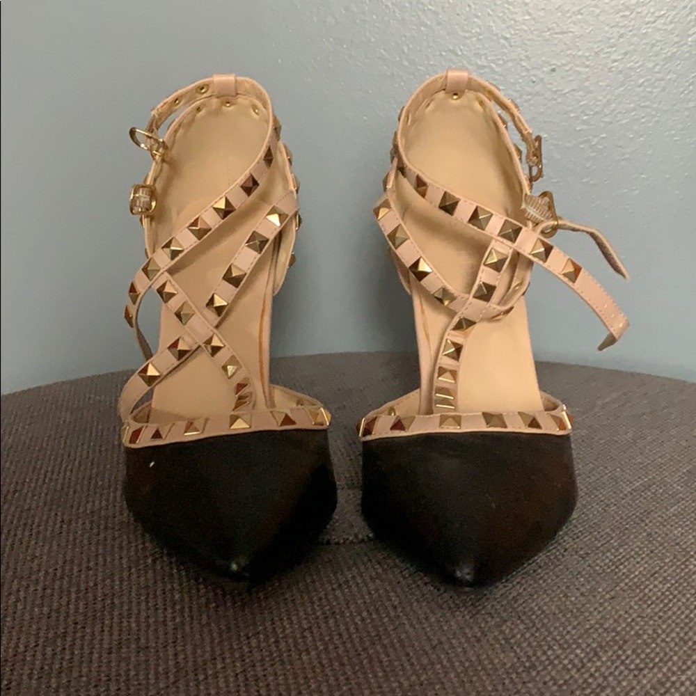 Studded black and tan pointed heels